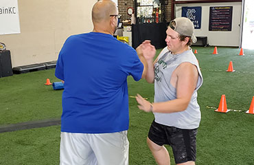 Offensive Line Football Training focuses on the techniques needed to play offensive line including center, guard and tackle. We work every class on an athlete's stance, then we teach a Zone Blocking Concept so we work on Power Steps, then keeping a base as we block with offensive line rubber boards. We work on striking then progress to pass blocking techniques.  This class is highly recommended for any youth player looking to be successful playing offensive line.